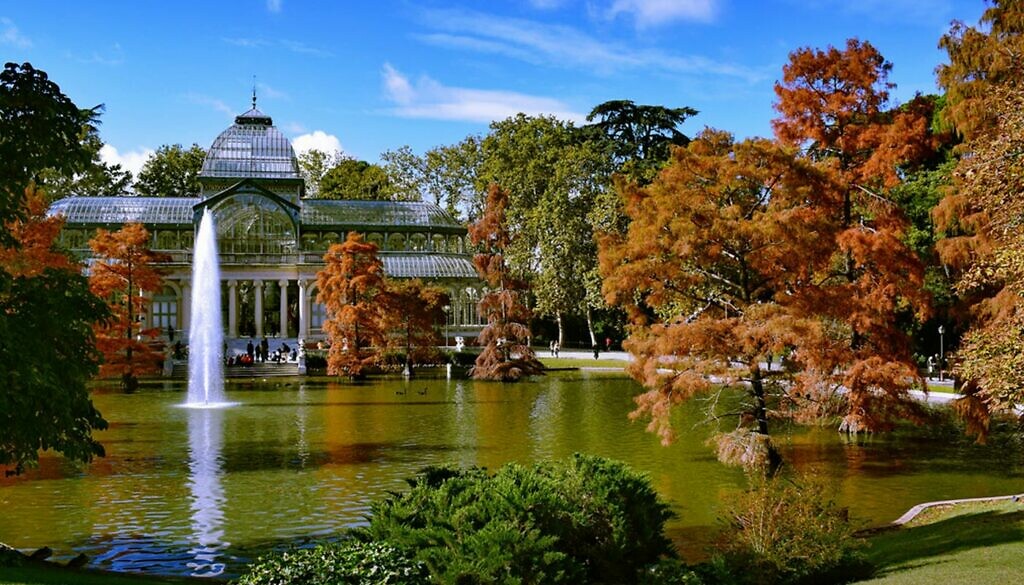 The Retiro Park in Madrid in Spain in autumn and the lake