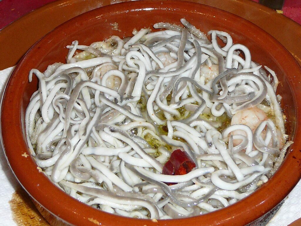 Angulas, on a plate in a restaurant representing Spanish food